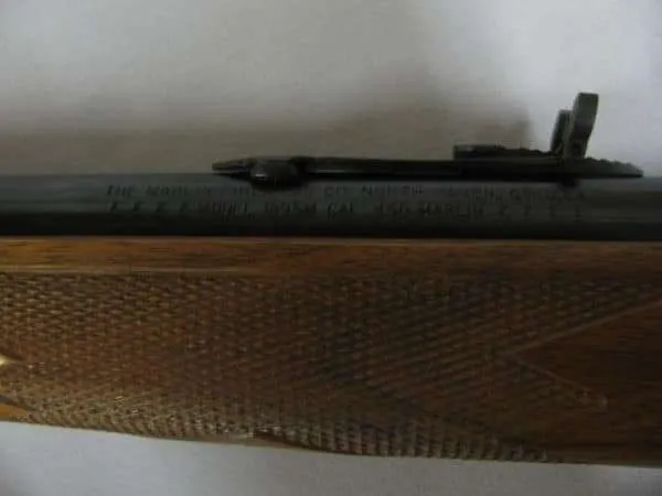 7674 marlin m1895, cal 450 marlin, lever action, swivel clamp studs, small dent in forearm, 98% condition.