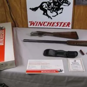 7883 winchester 101 pigeon lightweight, 28 ga, 28 inch barrels, straight grip, with correct box and paperwork, 5 briley chokes, (s, s, ic, m, f), wrench, snap caps, pouch, vent rib, quail engraved on coin silver receiver, winchester butt pad, aa+ fancy walnut, 99% condition, very hard to find in this configuration.