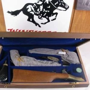 8013 colt 1860 army u.s. calvary commemorative two gun set, 44 cal, black powder, 8” barrel unfired, includes factory wooden english fitted display case with blue interior. has shoulder stock, blued bullet mold cap tin, powder flask, nipple wrench and key