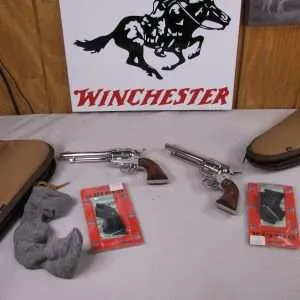 8042 ruger new vaquero 2 gun set consecutive serial numbers, 357 mag, 5 ½ barrel, polished stainless finish, hogue new vaquero smooth grips, includes original ruger plastic grips and allen gun rug. excellent condition, never fired